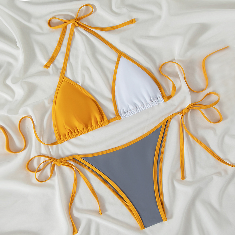 1653623709112382.jpg yellow and white triangle bikini.jpg